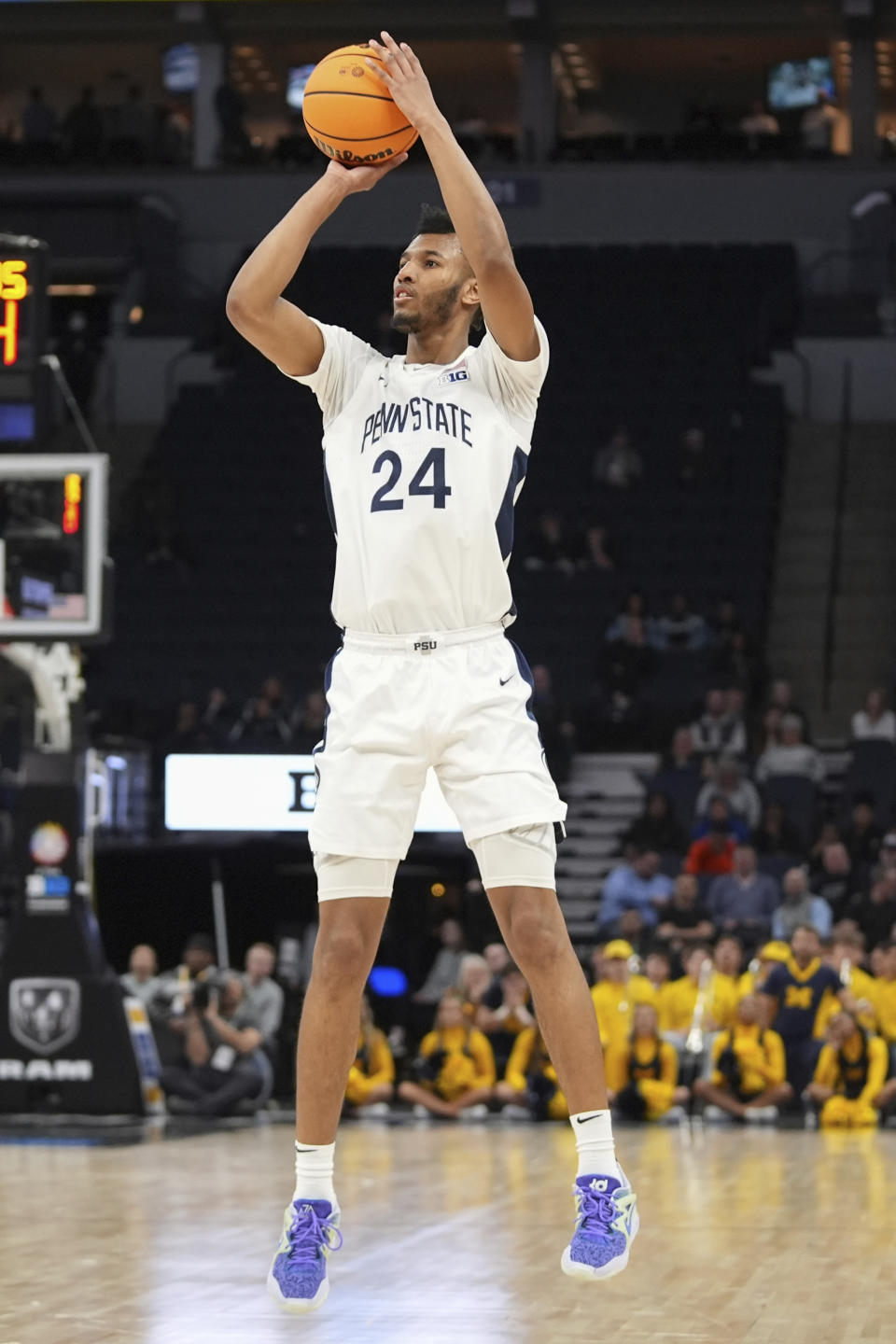 Penn State forward Zach Hicks (24) shoots against Michigan during the second half of an NCAA college basketball game in the first round of the Big Ten Conference men's tournament Wednesday, March 13, 2024, in Minneapolis. (AP Photo/Abbie Parr)