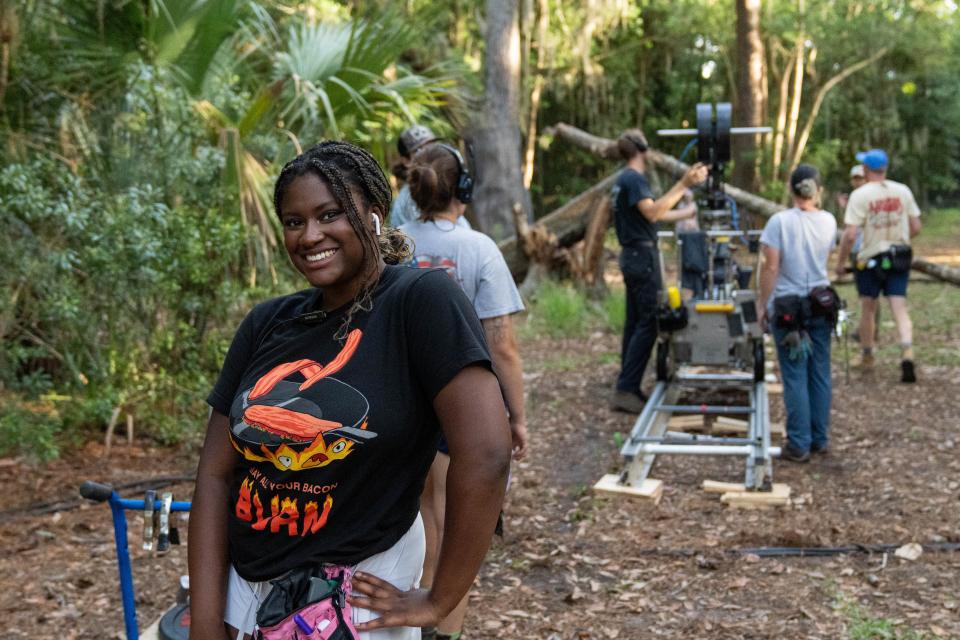 Georgia Film Academy Alumna Brianna Black taking a photo opportunity while on the set of “Somewhere in Dreamland” where she worked as the first team on-set costumer with principal cast.
