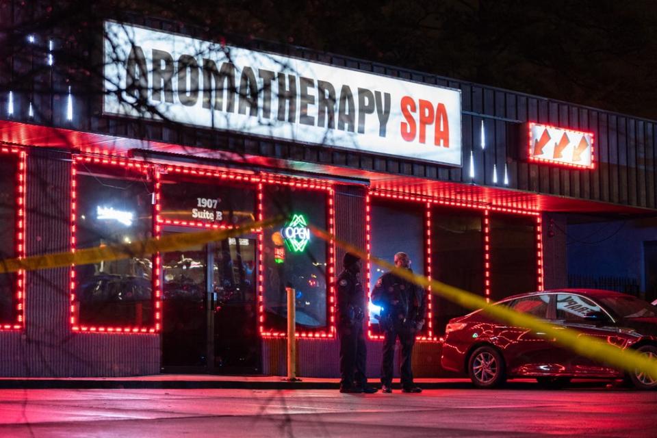 Outside a massage parlour in Atlanta, Georgia, were eight people were killed in shooting at three different spas on 16 March. (AFP via Getty Images)