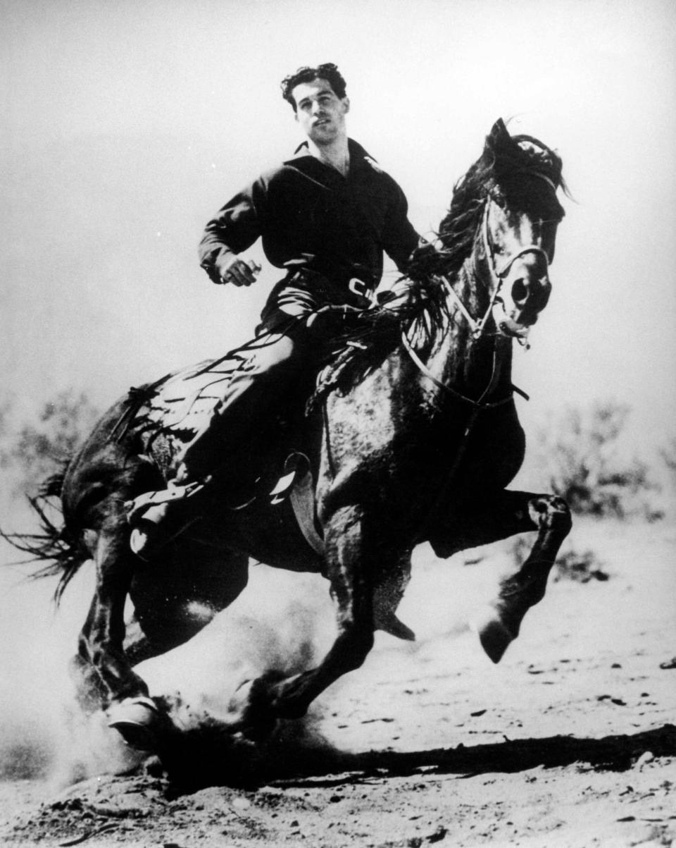 Frank Bogert on a horse, circa 1928, a photo used as the basis for a statue that sat in front of Palm Springs City Hall after he served as mayor. It has since been taken down because of controversy.
