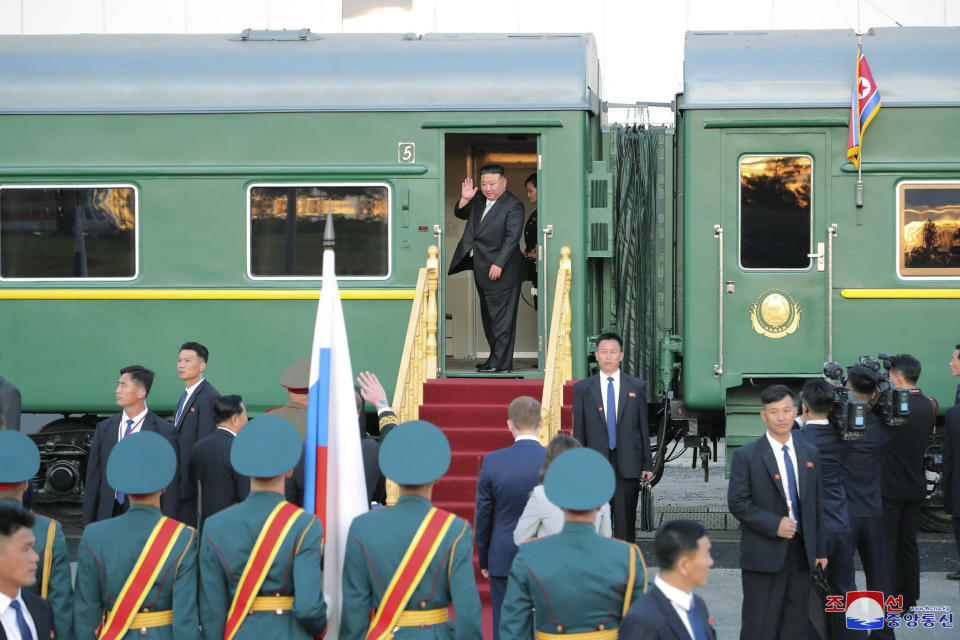 In this photo provided by the North Korean government, North Korean leader Kim Jong Un, center, leaves the Vostochny cosmodrome outside the city of Tsiolkovsky, about 200 kilometers (125 miles) from the city of Blagoveshchensk in the far eastern Amur region, Russia, Wednesday, Sept. 13, 2023. Independent journalists were not given access to cover the event depicted in this image distributed by the North Korean government. The content of this image is as provided and cannot be independently verified. Korean language watermark on image as provided by source reads: "KCNA" which is the abbreviation for Korean Central News Agency. (Korean Central News Agency/Korea News Service via AP)