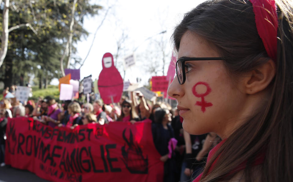 People march to protest the World Congress of Families, in Verona, Italy, Saturday, March 30, 2019. A congress in Italy under the auspices of a U.S. organization that defines family as strictly centering around a mother and father has made Verona — the city of Romeo and Juliet — the backdrop for a culture clash over family values, with a coalition of civic groups mobilizing against what they see as a counter-reform movement to limit LGBT and women's rights. (AP Photo/Antonio Calanni)