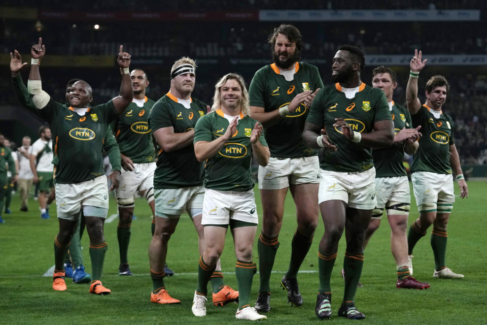 South Africa's players celebrate at the end of the Rugby Championship test between South Africa and New Zealand at Mbombela Stadium in Mbombela, South Africa, Saturday, Aug. 6, 2022. (AP Photo/Themba Hadebe)