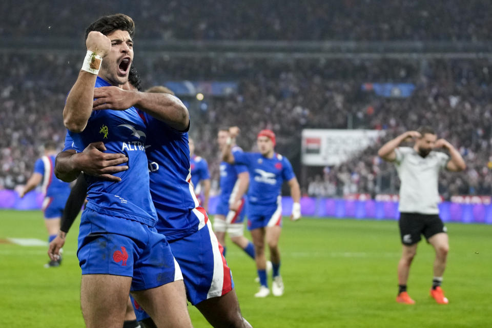 FILE - France's Roman Ntamack celebrates after scoring his team's second try during the international rugby union match between France and the All Blacks, at the Stade de France, in Saint Denis, north of Paris, Saturday, Nov. 20, 2021. Top-ranked Ireland and host nation France both provide compelling reasons to believe that the southern hemisphere's 16-year hold on the Rugby World Cup might come to an end this year. (AP Photo/Christophe Ena, File)