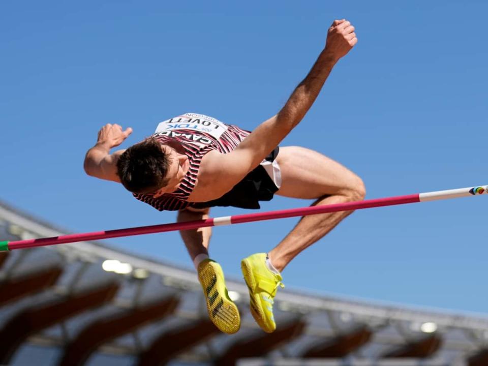 Canadian high jumper Django Lovett, seen during Friday's qualification, finished sixth in the men's final at the world championships after being unable to clear a bar of 2.30 metres on Monday at Hayward Field in Eugene, Ore. (Charlie Riedel/The Associated Press - image credit)