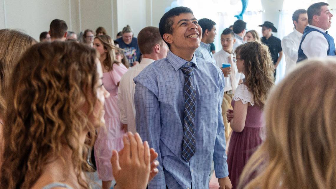 Eagle High School student Jacob Wills smiles as he dances during VIP Prom on Saturday at Potomac Manor Event Center. Mountain View High School Student Leadership hosted the event which was open to all West Ada School District students with special needs and their families.