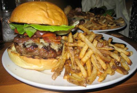The burger at Bobby’s Restaurant & Lounge on the ocean in Vero Beach is large and well-seasoned.