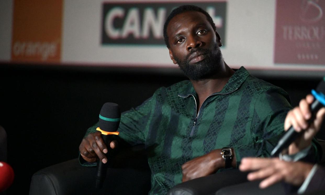 <span>Omar Sy, one of France’s most popular celebrities, has released a book in which he discusses growing up in the Paris banlieue.</span><span>Photograph: Seyllou/AFP/Getty Images</span>