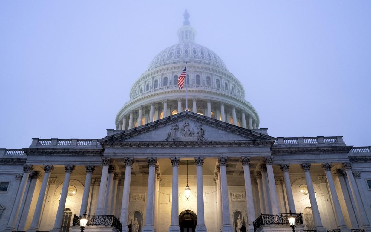 Fog surrounds the U.S. Capitol building in Washington, D.C., U.S., on Thursday, Oct. 22, 2020 - Bloomberg