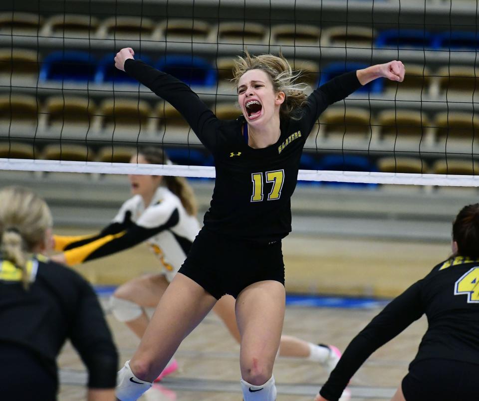Clear Spring's Addy Zeigler celebrates a point during the third set of the Maryland Class 1A state volleyball championship game. The Blazers swept South Carroll for the title.
