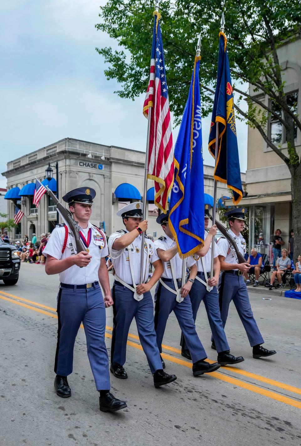 Members of St. John's Northwestern Military Academy Honor Guard march in Oconomowoc's annual Independence Day Parade on Saturday, July 2, 2022.