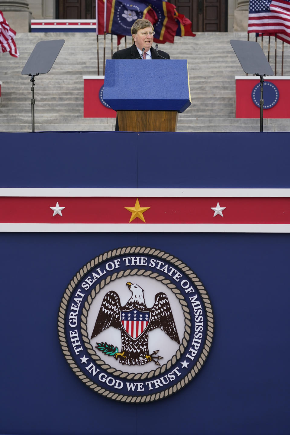 Mississippi Republican Gov. Tate Reeves delivers his address during his inauguration for a second term, at the Mississippi State Capitol in Jackson, Miss., Tuesday, Jan. 9, 2024. (AP Photo/Rogelio V. Solis)