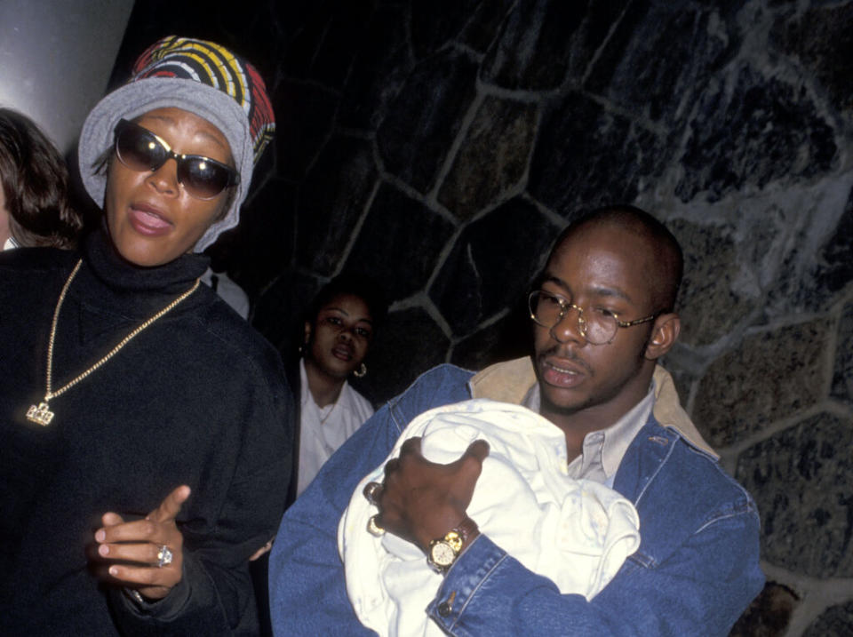 Bobby Brown 90s pictured: Bobby Brown and Whitney Houston with their newborn daughter