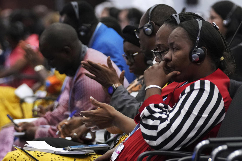 Delegates listen to speeches at the COP27 U.N. Climate Summit, Tuesday, Nov. 15, 2022, in Sharm el-Sheikh, Egypt. (AP Photo/Peter Dejong)