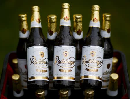 Bottles of Radeberger beer are pictured in Berlin, Germany, April 13, 2016. REUTERS/Hannibal Hanschke