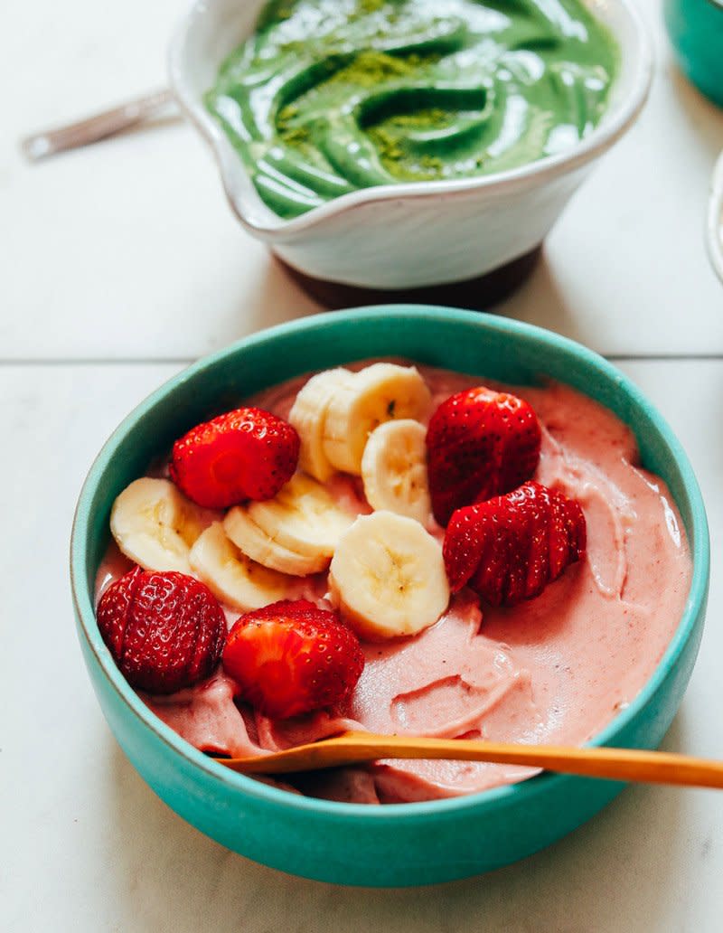 A bowl full of strawberry ice cream made from bananas and strawberries. 