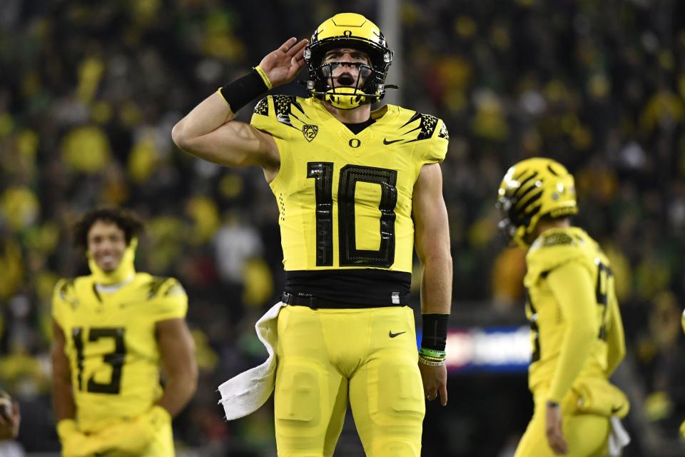 Oregon quarterback Bo Nix celebrates a touchdown against Washington Saturday, Nov. 12, 2022, in Eugene, Ore. Nix is one of several quality QBs the Utes will face this season. | Andy Nelson, Associated Press