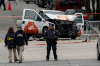 FBI agents and New York City Police Department (NYPD) investigate a pickup truck used in an attack on the West Side Highway in lower Manhattan in New York City, U.S., November 1, 2017. REUTERS/Brendan McDermid