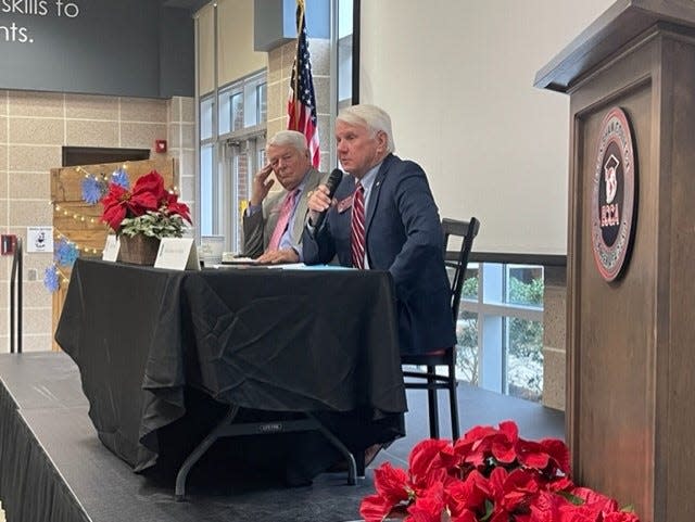 From left: Bill Hitchens and Jon Burns answer questions from the crowd during the Eggs and Issues Legislative Breakfast in Effingham County.