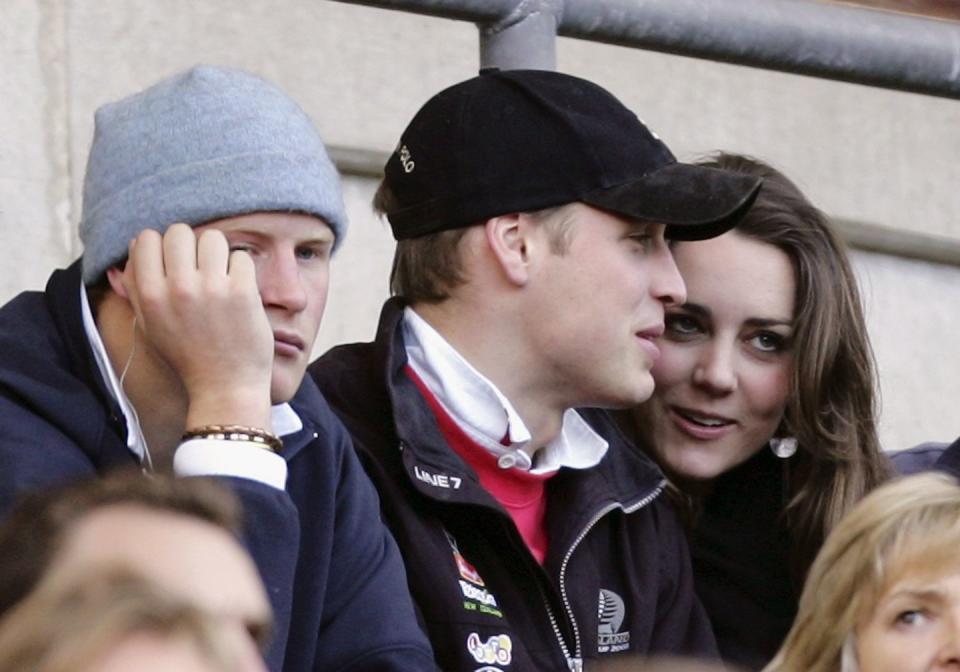 <p>While Prince Harry looks off into the distant, Kate and Will share a private chat in the stands during the RBS Six Nations Championship match.<br></p>