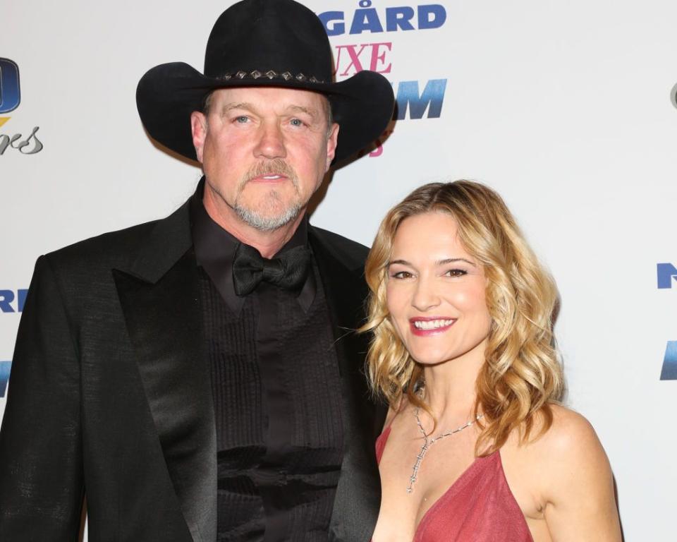 pacific palisades, ca   february 26  country singer trace adkins l and actress victoria pratt r attend the 27th annual night of 100 stars black tie dinner viewing gala at the villa aurora on february 26, 2017 in pacific palisades, california  photo by paul archuletafilmmagic
