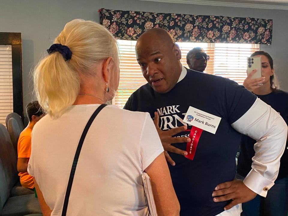 Mark Burns, a 2024 GOP candidate in the 3rd Congressional District, speaks to voters after a McCormick County Republican Party forum on Saturday, May 18, 2024.