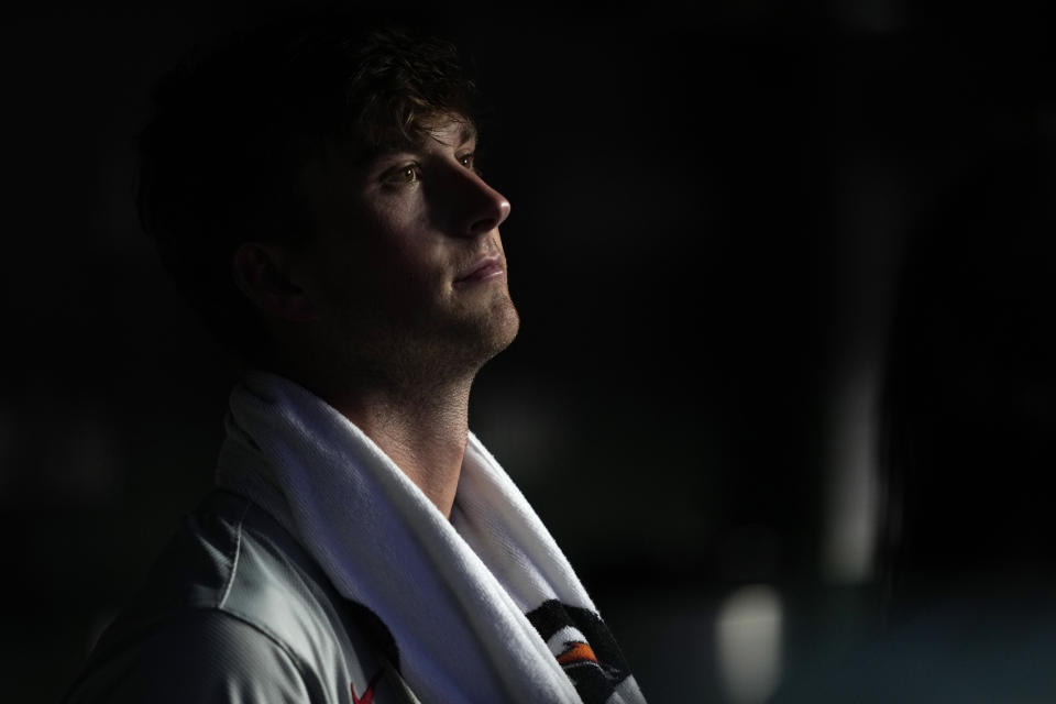 Philadelphia Phillies starting pitcher Michael Mercado looks out from the dugout during the fifth inning of a baseball game against the Chicago Cubs Tuesday, July 2, 2024, in Chicago. (AP Photo/Charles Rex Arbogast)