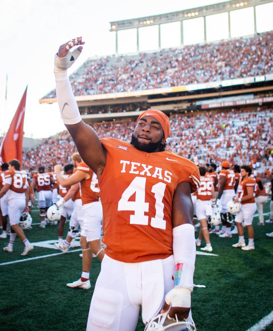 Linebacker Jaylan Ford, celebrating after the Longhorns' win over Kansas, leads the team with 40 tackles.