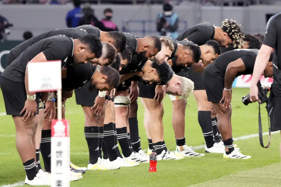 New Zealand All Blacks players greets the spectators after winning over Japan during a rugby test match between the All Blacks and Japan at the National Stadium in Tokyo, Japan, Saturday, Oct. 29, 2022. (AP Photo/Shuji Kajiyama)