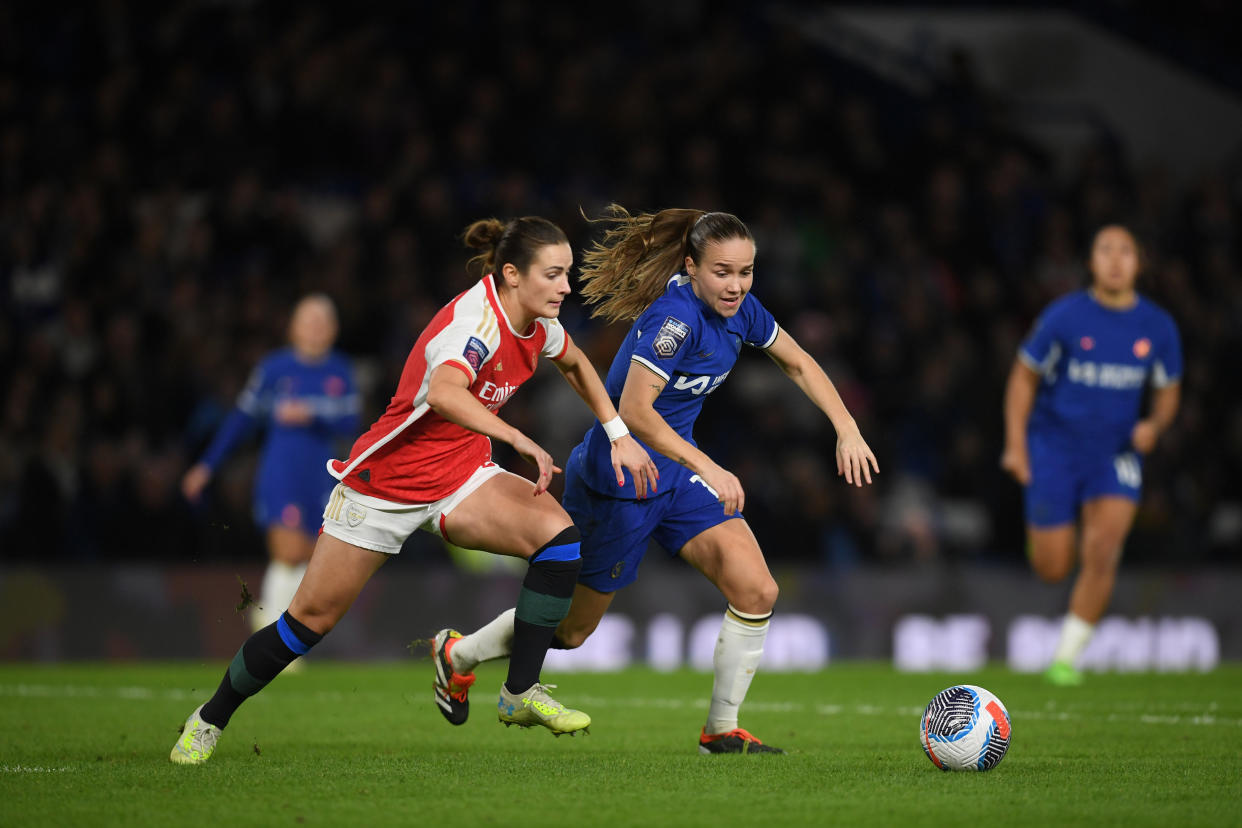LONDON, ENGLAND - MARCH 15: Emily Fox of Arsenal is challenged by Guro Reiten of Chelsea during the Barclays Women´s Super League match between Chelsea FC and Arsenal FC at Stamford Bridge on March 15, 2024 in London, England. (Photo by Harriet Lander - Chelsea FC/Chelsea FC via Getty Images)