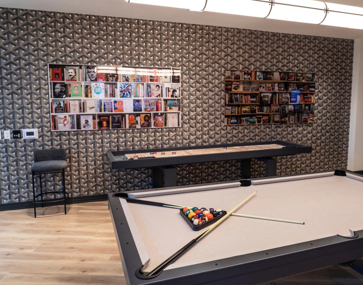 A game area is seen in a space to hangout during a ribbon-cutting event for the newly completed Perennial Corktown upscale housing development in Corktown on Thursday, Jan. 11, 2024.