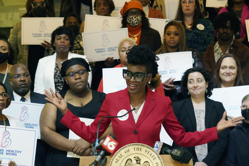 Cassandra Welchlin, executive director of the Mississippi Black Women's Roundtable, addresses reporters during a news conference by the group, during which they presented their legislative agenda which included extending postpartum coverage for Medicaid recipients up from the current 60-day window to 12 months, Thursday, Jan. 26, 2023, at the Mississippi Capitol in Jackson. (AP Photo/Rogelio V. Solis)