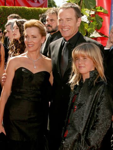 <p>Kevin Winter/Getty</p> Bryan Cranston with his wife Robin Dearden and their daughter Taylor Dearden Cranston at the 58th Annual Primetime Emmy Awards on August 27, 2006 in Los Angeles, California.