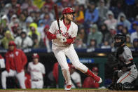 Philadelphia Phillies' Alec Bohm is hit by a pitch from San Francisco Giants' Keaton Winn with the bases loaded to score a run during the first inning of a baseball game, Saturday, May 4, 2024, in Philadelphia. (AP Photo/Matt Slocum)