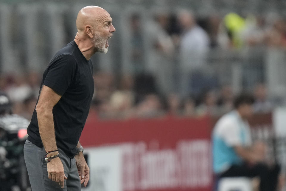 AC Milan's manager Stefano Pioli shouts during a Serie A soccer match between AC Milan and Lazio, at the San Siro stadium in Milan, Italy, Saturday, Sept. 30, 2023. (AP Photo/Luca Bruno)