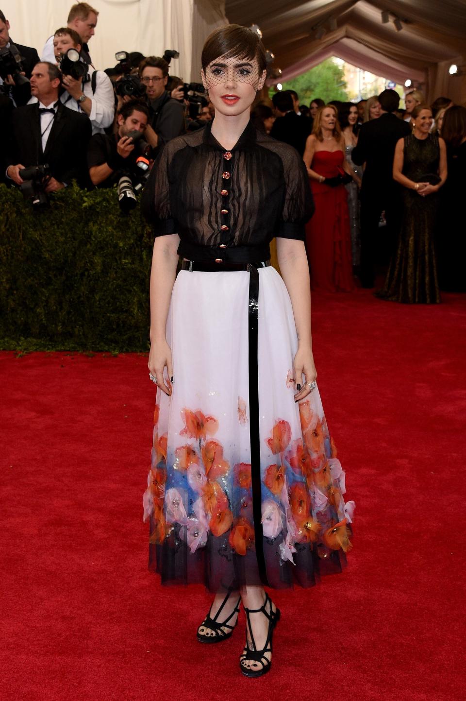 <h1 class="title">Lily Collins in Chanel Haute Couture</h1><cite class="credit">Photo: Getty Images</cite>