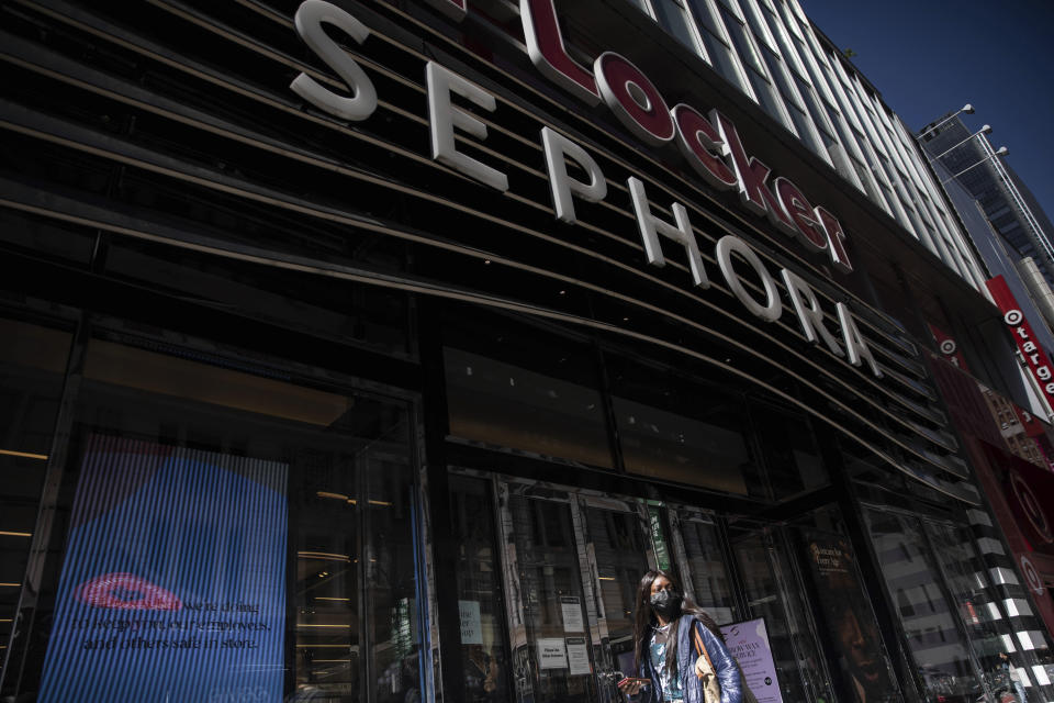 A woman walks outside a Sephora store in New York on Friday, May 7, 2021. The beauty retailer recently announced a commitment to devote at least 15% of its store shelves to Black-owned brands. (AP Photo/Robert Bumsted)