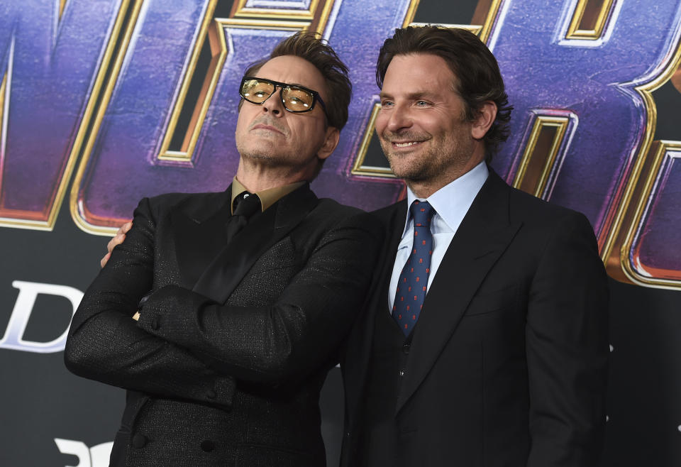 Robert Downey Jr., left, and Bradley Cooper arrive at the premiere of "Avengers: Endgame" at the Los Angeles Convention Center on Monday, April 22, 2019. (Photo by Jordan Strauss/Invision/AP)