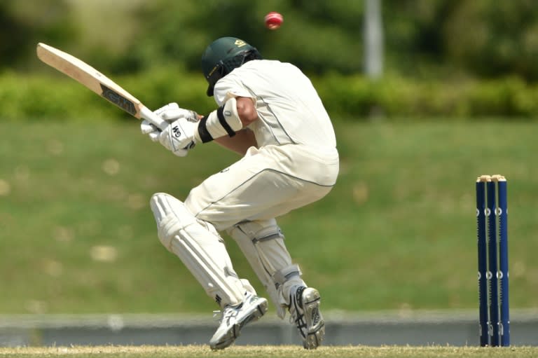 Australia XI's Jason Sangha avoids a bouncer from England's pace bowler Chris Woakes on the fourth and final day of a four-day Ashes tour match