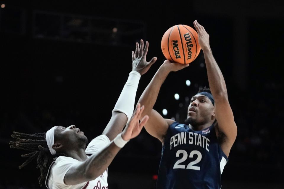 Penn State's Jalen Pickett, shown putting up a shot during Thursday's first-round win over Texas A&M, is the closest thing college basketball has to a triple-double threat: no other player in the country averages the 17 points, seven rebounds and six assists a game that Pickett does.