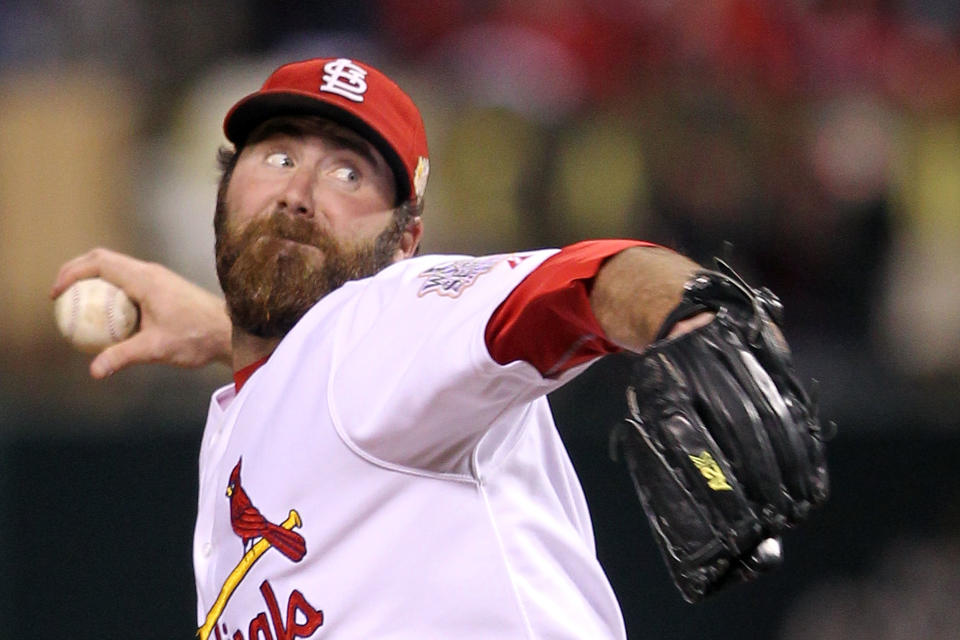 ST LOUIS, MO - OCTOBER 27: Jason Motte #30 of the St. Louis Cardinals pitches in the ninth inning during Game Six of the MLB World Series against the Texas Rangers at Busch Stadium on October 27, 2011 in St Louis, Missouri. (Photo by Ezra Shaw/Getty Images)