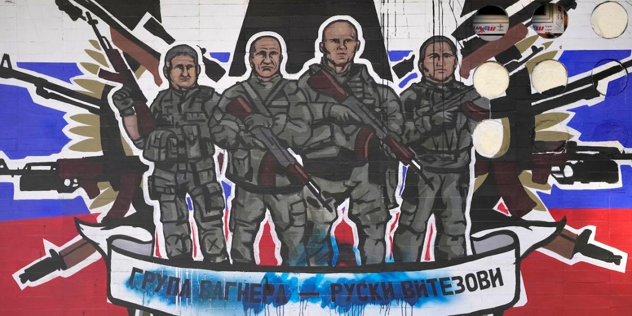 A mural depicting Russia's Wagner Group that reads: "Wagner Group - Russian knights."