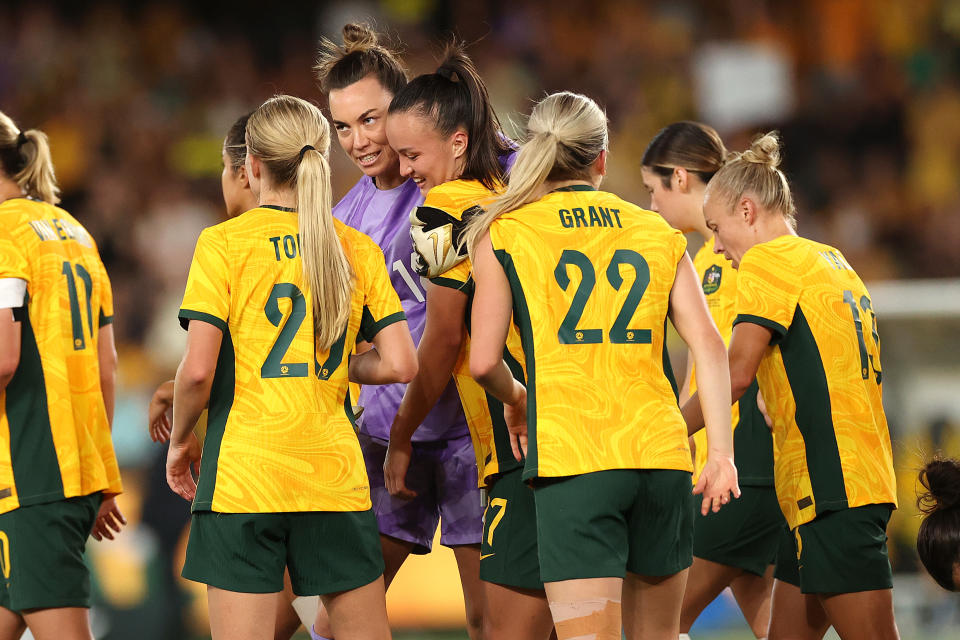 MELBOURNE, AUSTRALIA - FEBRUARY 28: Amy Sayer of Australia celebrates scoring just before full time with Mackenzie Arnold of Australia during the AFC Women's Olympic Football Tournament Paris 2024 Asian Qualifier Round 3 match between Australia Matildas and Uzbekistan at Marvel Stadium on February 28, 2024 in Melbourne, Australia. (Photo by Kelly Defina/Getty Images)