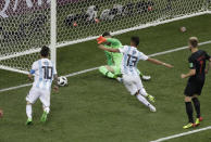 <p>Lionel Messi and Maximiliano Meza are denied by Croatia goalkeeper Danijel Subasic in Argentina’s best chance to score. (AP) </p>