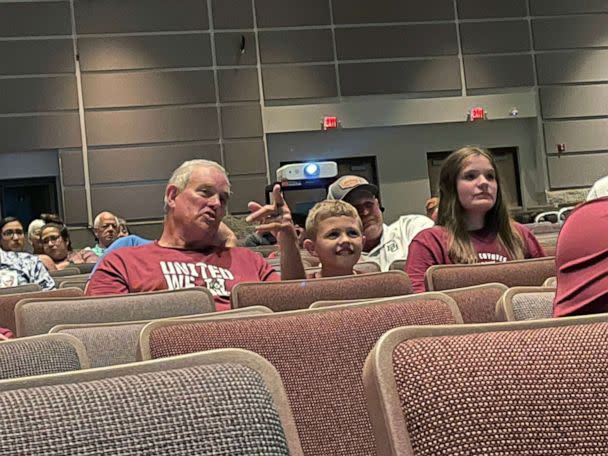 PHOTO: Families watch the Uvalde 1972 football championship at the Uvalde High School auditorium Sept. 3, 2022. (Emily Shapiro/ABC News)