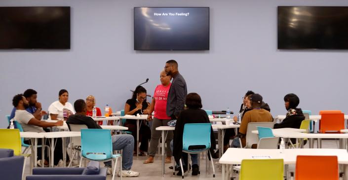 Robert Moore, a chaplain with Goodwill and case manager with Joshua Community Connectors, teaches a class at Goodwill on Thursday night.Oct. 26, 2021