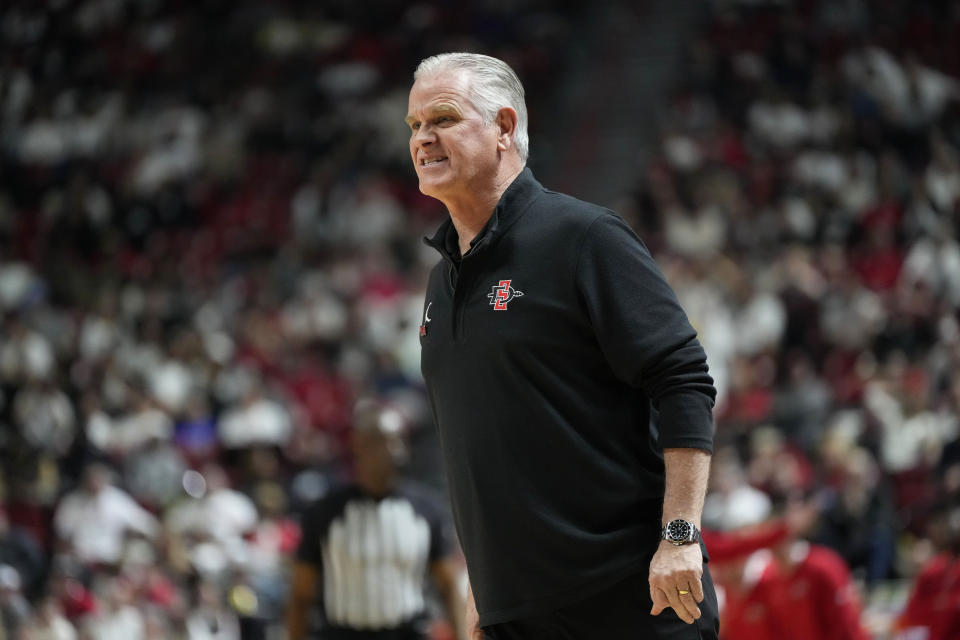 San Diego State coach Brian Dutcher watches during the first half of the team's NCAA college basketball game against UNLV on Tuesday, March 5, 2024, in Las Vegas. (AP Photo/Lucas Peltier)