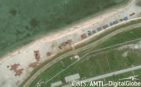 Satellite imagery shows what the CSIS Asia Maritime Transparency Initiative describes as the deployment of several new weapons systems to China’s base on Woody Island in the Paracels, South China Sea May 12, 2018. Courtesy CSIS Asia Maritime Transparency Initiative/DigitalGlobe/Handout via REUTERS