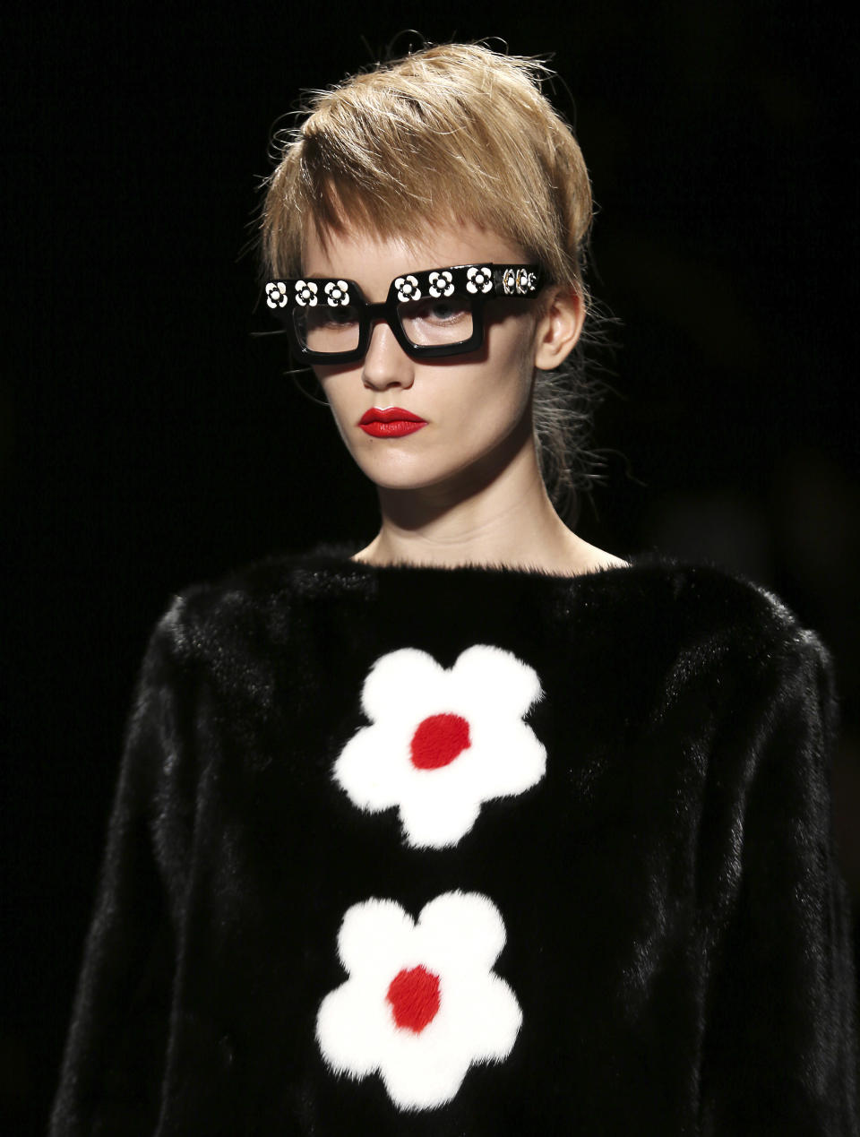 A model wears a creation part of the Prada Women's Spring-Summer 2013 fashion collection, during the fashion week in Milan, Italy, Thursday, Sept. 20, 2012. (AP Photo/Antonio Calanni)