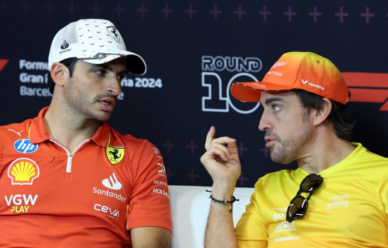 Carlos Sainz (left) and Fernando Alonso discussing Thursday's Euro 2024 game between <a class="link " href="https://sports.yahoo.com/soccer/teams/spain/" data-i13n="sec:content-canvas;subsec:anchor_text;elm:context_link" data-ylk="slk:Spain;sec:content-canvas;subsec:anchor_text;elm:context_link;itc:0">Spain</a> and <a class="link " href="https://sports.yahoo.com/soccer/teams/italy-women/" data-i13n="sec:content-canvas;subsec:anchor_text;elm:context_link" data-ylk="slk:Italy;sec:content-canvas;subsec:anchor_text;elm:context_link;itc:0">Italy</a> (Thomas COEX)